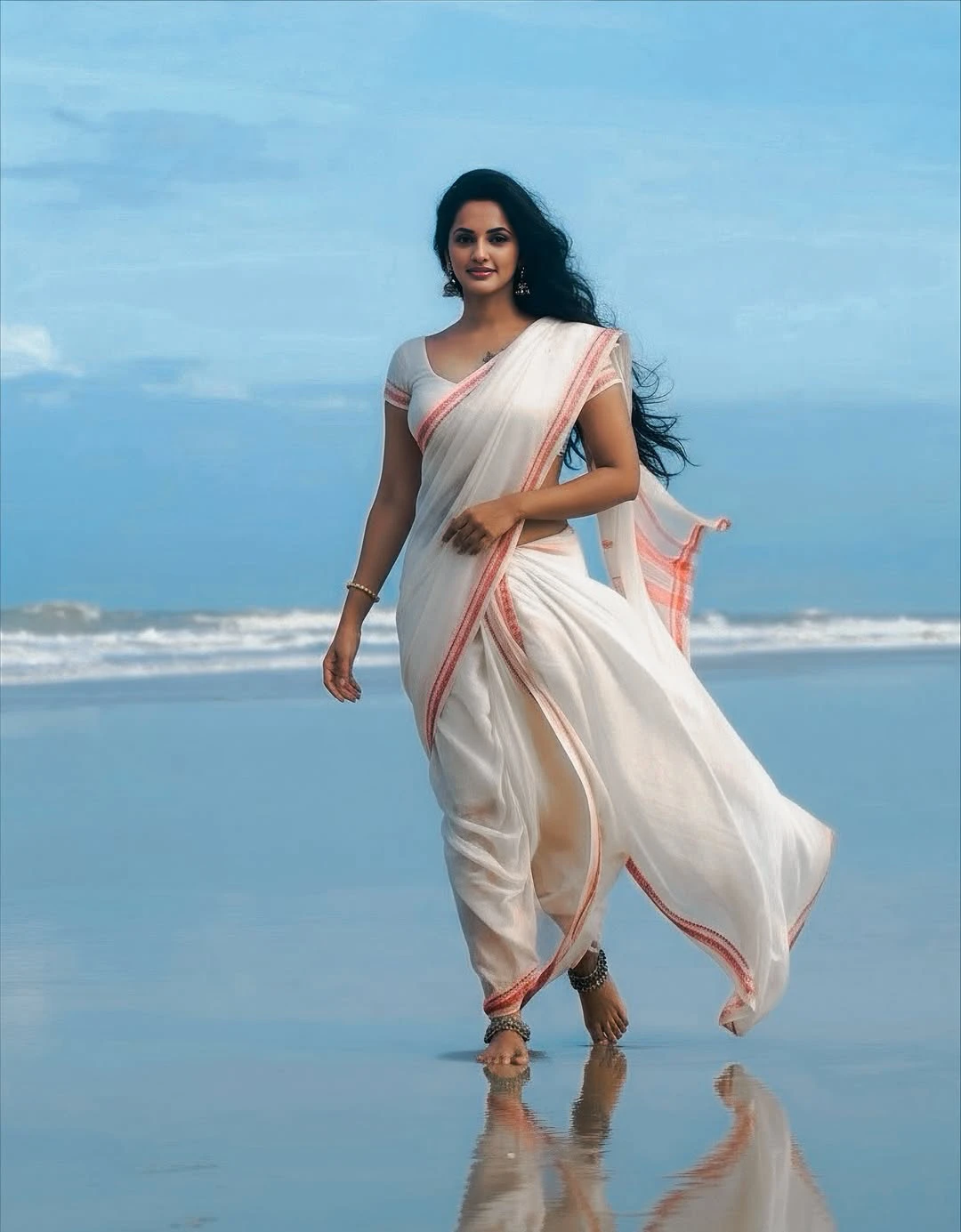 JyotiPoorvaj Stunning Looks in White Saree at Beach
